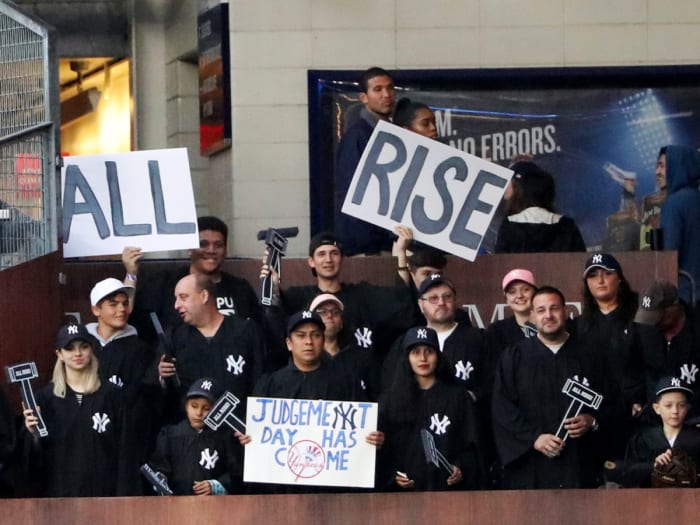May 22, 2017; Bronx, NY, USA; Fans seated in the right field fan section named “The Judges Chambers” for New York Yankees right fielder Aaron Judge (99) (not pictured) wear judges robes during the game against the Kansas City Royals at Yankee Stadium.